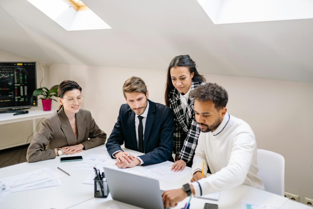 Business professionals discussing customer experience strategies to improve engagement, trust, and long-term brand growth